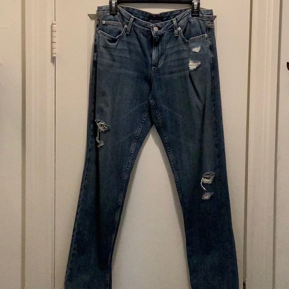Theory straight leg distressed jean in medium blue.